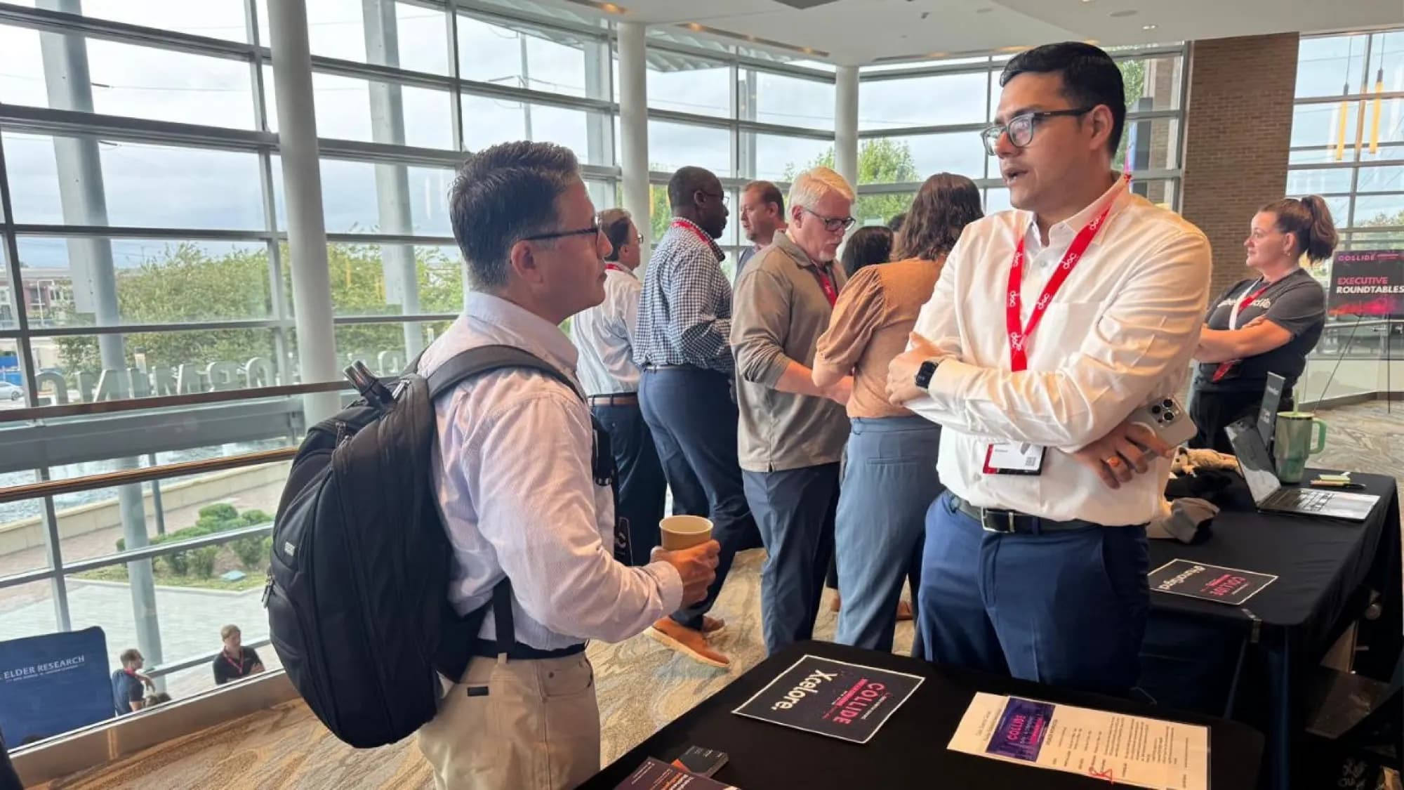Leaders in conversation at an industry event
